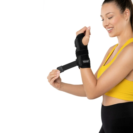 Merev sínnel ellátott csuklórögzítő bal kézre