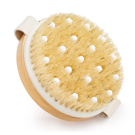 Kitüremkedéssel ellátott masszázskefe szárazon végzett testmasszázshoz