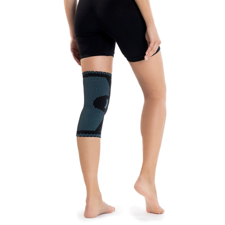 Rugalmas térdszorító térdkalács-stabilizátorral, M, kék