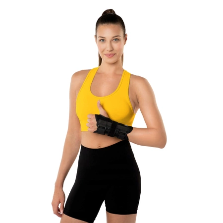 Merev sínnel ellátott csuklórögzítő bal kézre