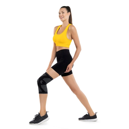 Rugalmas térdszorító térdkalács-stabilizátorral, M, szürke