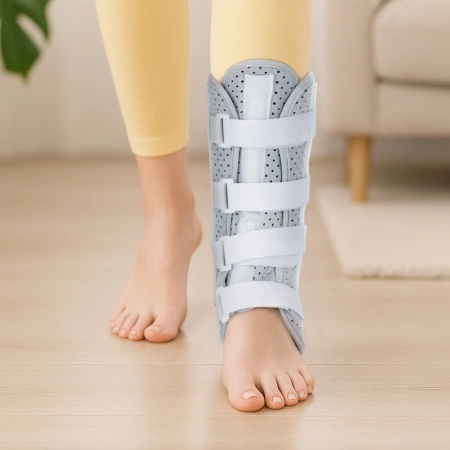 Oldalsó merevítővel ellátott bokarögzítő